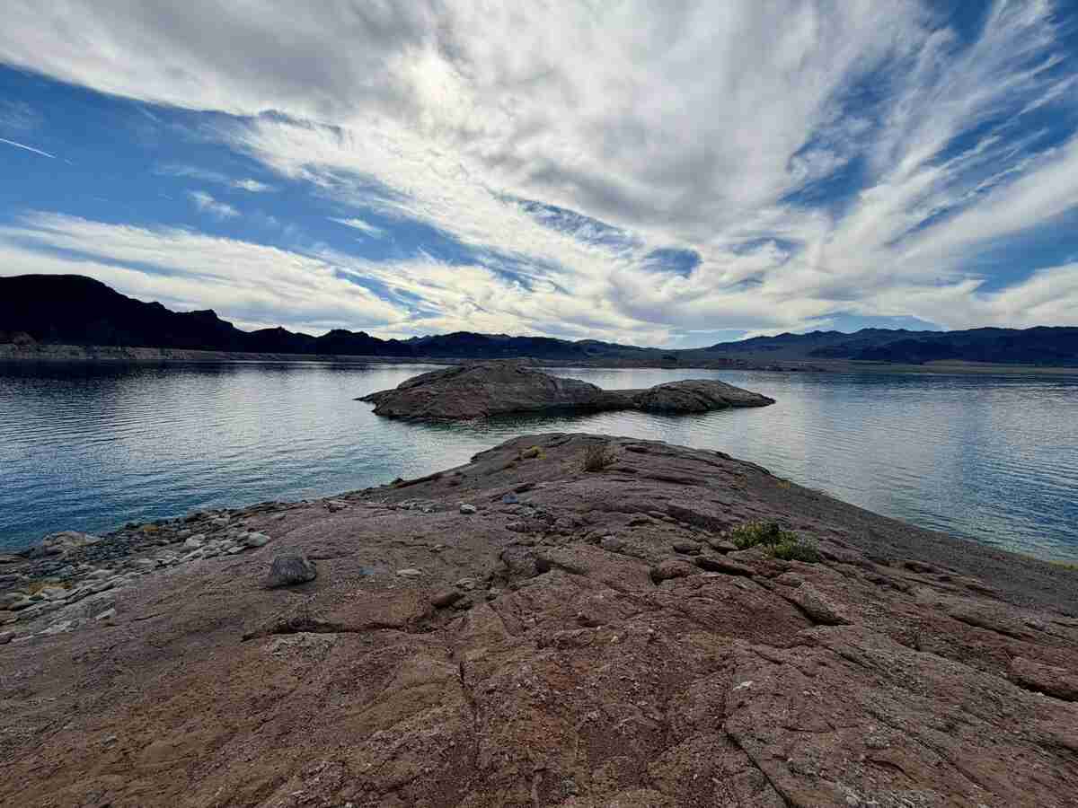 Lake Mead campground with blue water and desert mountains