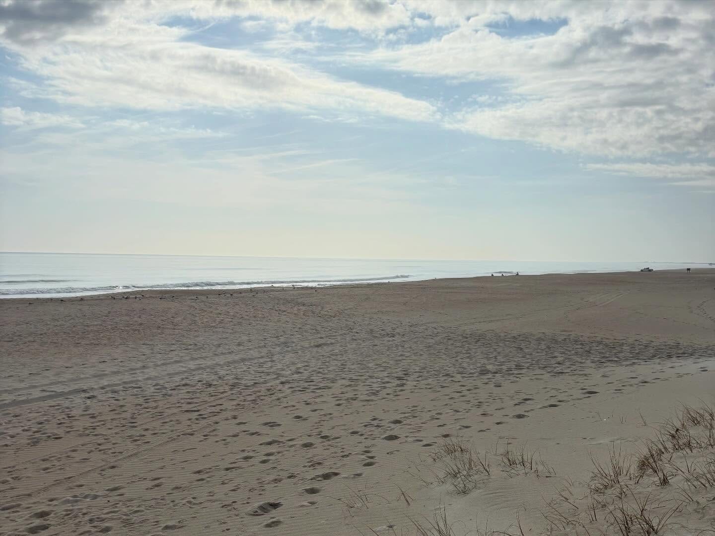 Historic Civil War era Fort Macon fortifications at Atlantic Beach with the Crystal Coast shoreline behind it, North Carolina